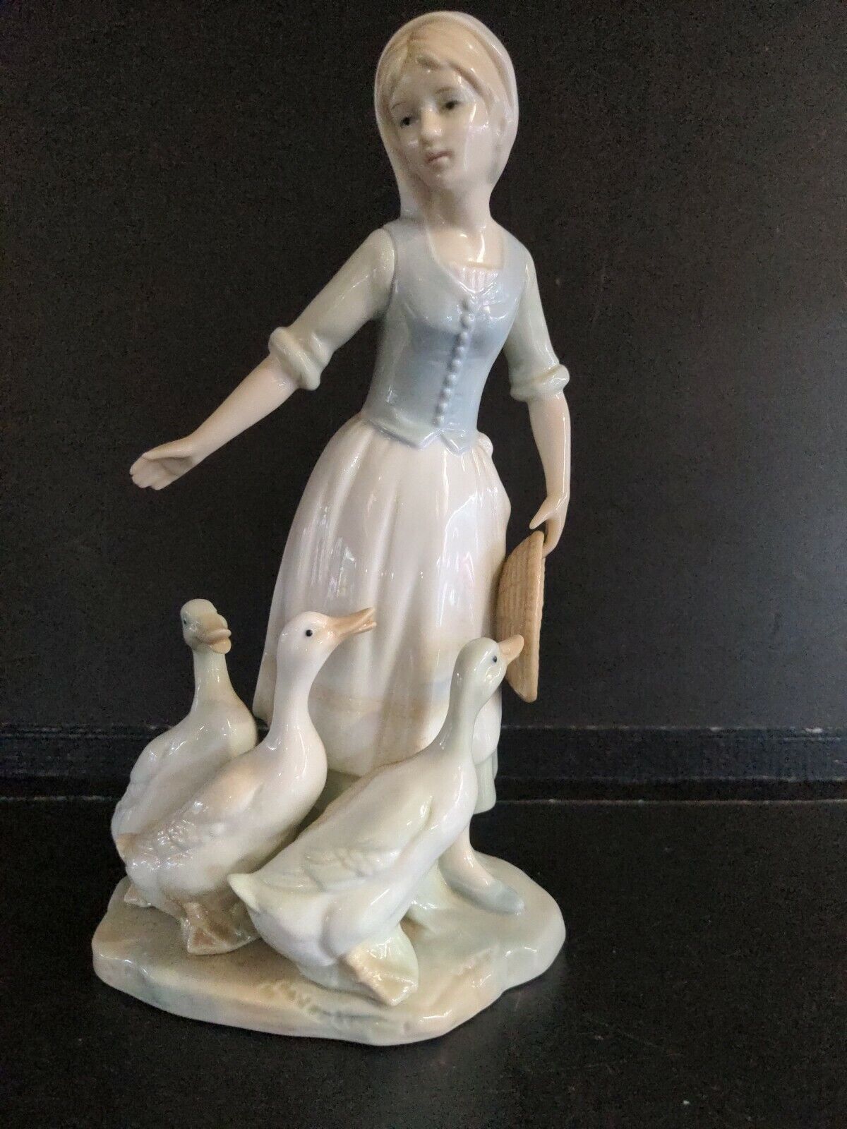 figurine of a Lady with three Ducks Marks & Spencer St Michael Geese?